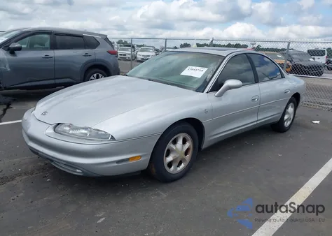 1999 Oldsmobile Aurora из США, поврежденный, VIN 1G3GR62C1X4115577